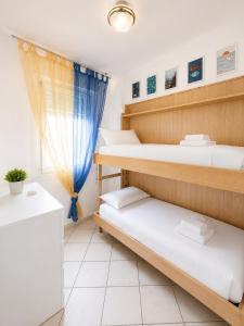 Faro Blu - Appartamento Vista Mare con Spiaggia e Parcheggio Privato