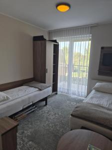 Domki, Apartamenty i Restauracja Włóczęga