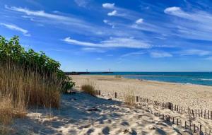 T2 à 600 m Plage - Clim - Parking - Balcon - Wi-Fi