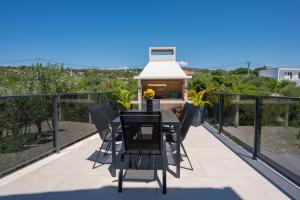 Beachfront Villa Marivi with Pool, Jacuzzi and Game Room