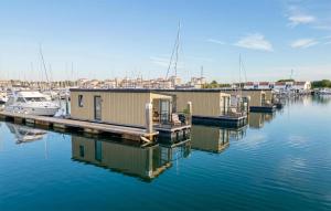 Beach Front Ship In Ouddorp With House Sea View