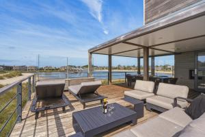Villa 67 – Pastel Palette | Design villa by the beach with views over the water