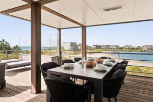 Villa 67 – Pastel Palette | Design villa by the beach with views over the water