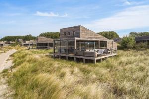 Villa 67 – Pastel Palette | Design villa by the beach with views over the water