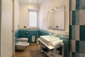 Camera Matrimoniale/Doppia con Letti Singoli con Bagno
