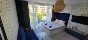 Boutique studio, free parking, pool view, garden, secured complex