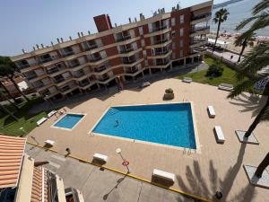 Apartamento frente al mar con WIFI y parking.