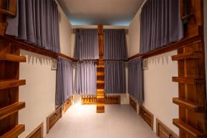 The Purple Pineapple Beach Hostel