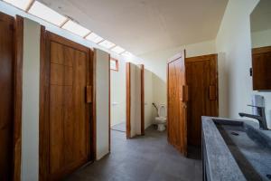 The Purple Pineapple Beach Hostel