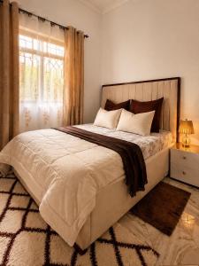Cozy Retreat in Arusha - power 24hrs -Firepit - Free Parking- Garden swing- Fast Wi-Fi