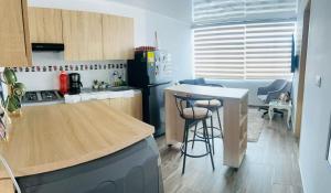 Apartamento moderno cerca al aeropuerto
