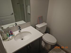 Luxury Single Suite with a closet, ensuite bathroom & laundry & dining space & kitchen