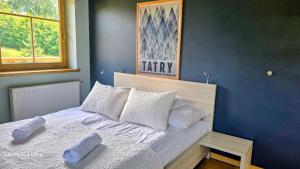 Domek za Strugiem - pokoje i apartamenty