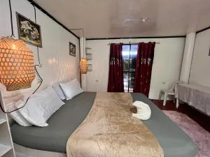 Casa de Viajeros AC room 2nd flr 600mbps spacious 5 minutes to the beach