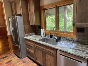 Remodeled 4BR 2 5BA Peninsula Lakehouse at 5RK Ranch Lakeside Private Sandy Shoreline Fireplace & Decks Hayward WI