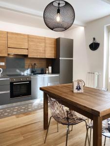 Home AG - AffittiPontediLegno
