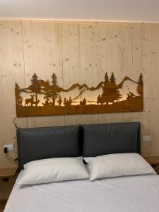 Home AG - AffittiPontediLegno