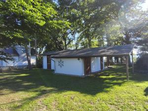Schönes Ferienhaus mit Seeblick & Garten am Plauer See
