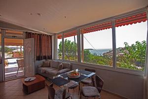 Voula Home