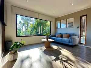 Cabaña en el bosque con tinaja privada