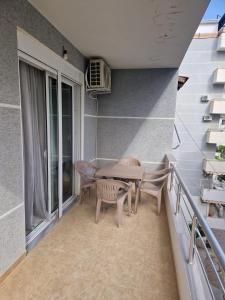 Bright Two-Bedroom Apartment with Balcony
