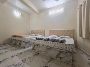 Kalpavrukksha Luxury Service Apartment- Unit 4 - 1 BHK 2 King Size Cot Setup
