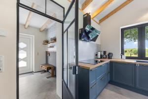Exklusives Ferienhaus im Erstbezug mit unverbautem Blick auf das Salzhaff