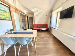 Apartmány u komína