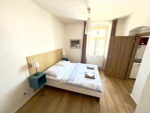 Apartmány u komína