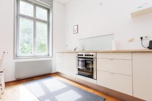 FullHouse - Leipzig - M14 Apartments - Balcony - SmartTV