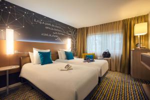 Hotels Mercure Paris Sud Les Ulis-Courtaboeuf : photos des chambres