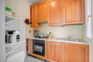Palms Villa - Sea View Terrace and Parking - Happy Rentals