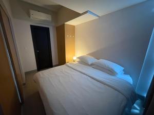 Cozy 1 Bedroom in Uptown Park Suites BGC