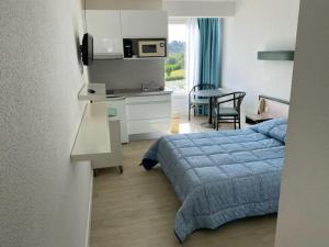 Studio vue mer et piscine
