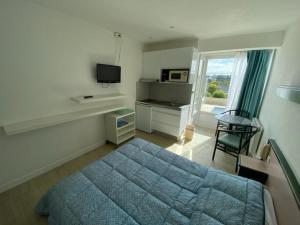 Studio vue mer et piscine