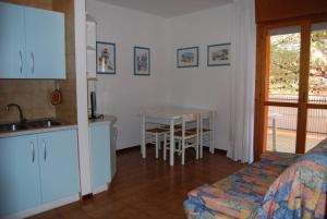 Warm two-room flat with balcony near the beach