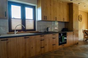 Domek z sauną i jacuzzi Leśny Azyl - Mosna