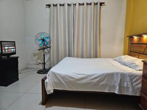 Habitacion en Suite Taxi aeropuertario