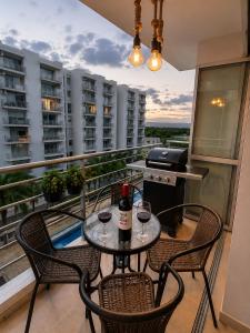 Lindo Apartamento completo, piscinas, BBQ y terraza