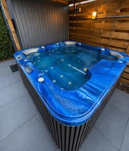 Cozy wellness chalet and private garden with jacuzzi sauna and outdoor bath between Amsterdam Haarlem and Schiphol Airport