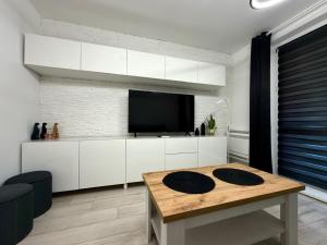 Komfortowe Mieszkanie z Sypialnią i Balkonem