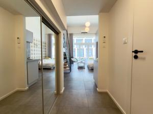 Wrocław Airport Apartment with Mezzanine by BookingHost