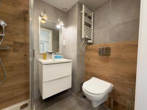 Wrocław Airport Apartment with Mezzanine by BookingHost