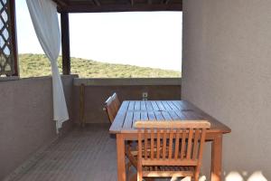 Cugnana Verde Terrace with Bay View