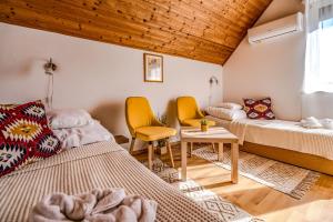 Pávics Apartmanok