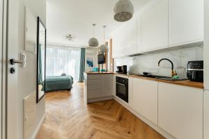 Mostek Riverside Deluxe Studio by BookingHost