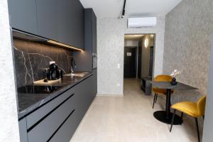 Szauter Aparthomes A