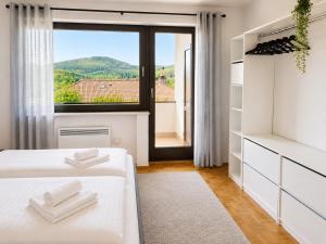Ferienwohnung Seeblick 24