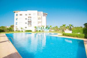 2-Bedroom Apartment with Balcony & Pool