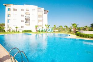 Bright Blue Retreat, Balcony & Pool